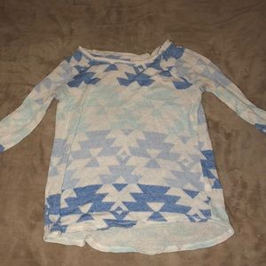 Shirt that buttons at elbow.